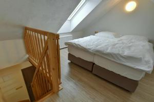 Posteľ alebo postele v izbe v ubytovaní Zamecka Fortovna Obora - Forester House