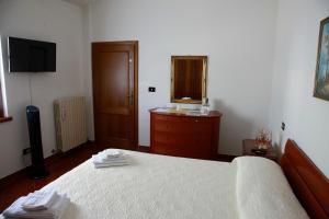 Postel nebo postele na pokoji v ubytování Casa Il Ceppo