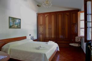 Postel nebo postele na pokoji v ubytování Casa Il Ceppo