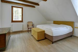 Posteľ alebo postele v izbe v ubytovaní Zamecka Fortovna Obora - Forester House