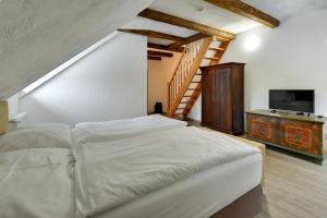 Posteľ alebo postele v izbe v ubytovaní Zamecka Fortovna Obora - Forester House