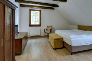 Posteľ alebo postele v izbe v ubytovaní Zamecka Fortovna Obora - Forester House