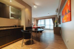 Dapur atau dapur kecil di ARC Arenales Studios & Suites