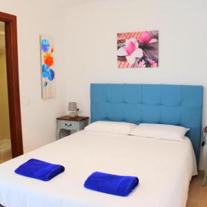 Postel nebo postele na pokoji v ubytování Casa Mate Cotillo Mar
