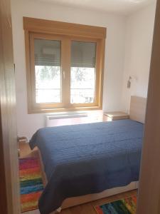 En eller flere senge i et værelse på Despot