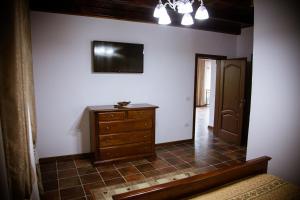 TV a/nebo společenská místnost v ubytování Casa Poenita
