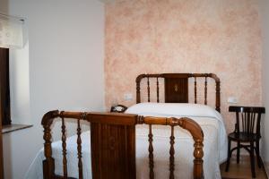 Posteľ alebo postele v izbe v ubytovaní Casa Rural Abuela Tina