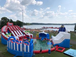 a group of inflatable slides in a water park at Luxury Camping POD in Zarasai