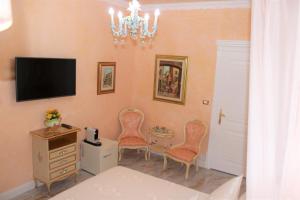 TV a/nebo společenská místnost v ubytování FD Luxury rooms