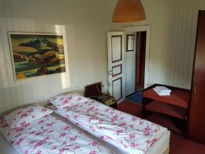 Letto o letti in una camera di Guesthouse Gamli Bær