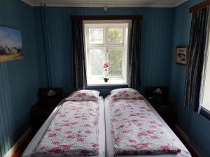 Letto o letti in una camera di Guesthouse Gamli Bær