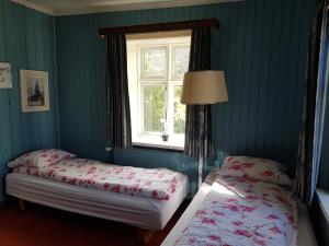 Letto o letti in una camera di Guesthouse Gamli Bær