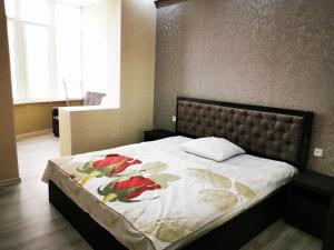 Posteľ alebo postele v izbe v ubytovaní Golden Apartments