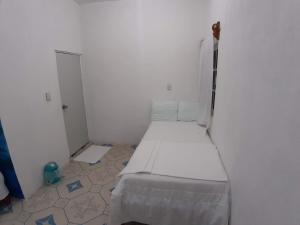 Postel nebo postele na pokoji v ubytování Habitaciones Chiquil Ha