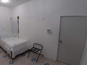 Postel nebo postele na pokoji v ubytování Habitaciones Chiquil Ha