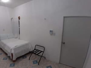 Postel nebo postele na pokoji v ubytování Habitaciones Chiquil Ha