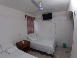 Postel nebo postele na pokoji v ubytování Habitaciones Chiquil Ha