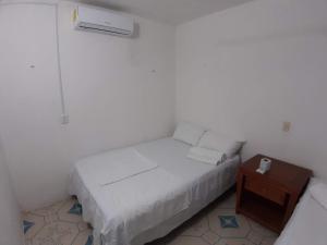 Postel nebo postele na pokoji v ubytování Habitaciones Chiquil Ha