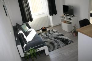 TV a/nebo společenská místnost v ubytování Stylish Apartment in City Center