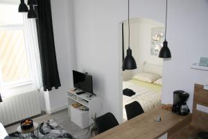 TV a/nebo společenská místnost v ubytování Stylish Apartment in City Center