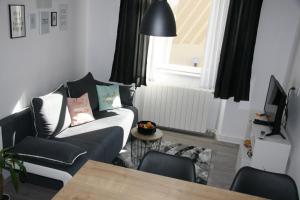 Posezení v ubytování Stylish Apartment in City Center
