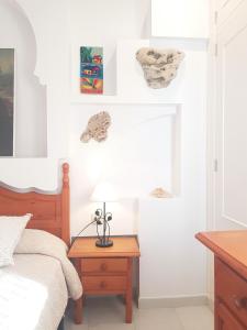 Llit o llits en una habitació de Conil con sabor a mar