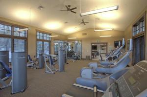 a gym with a bunch of chairs and machines at Luxury 4BD Village at Northstar Residence - Iron Horse South 412 in Truckee