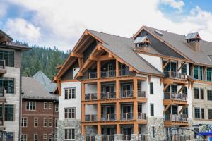 an image of an apartment building with balconies at Stunning Top Floor Village at Northstar Residence! - Big Horn 502 in Truckee