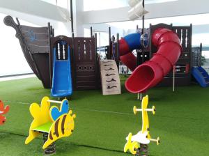 a playground with many different types of playground equipment at The Wave Residence in Malacca +22 photos
