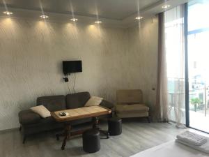 Χώρος καθιστικού στο Hotel Chaika