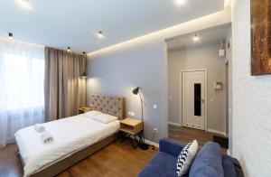 Cama o camas de una habitación en Loft apartment in old Lviv AC Fireplace