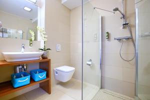 Kúpeľňa v ubytovaní Apartamenty AmberHome