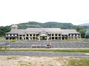 a large building on the side of a road at SERDANG LAKE VIEW RESORT in Sungai Kechil