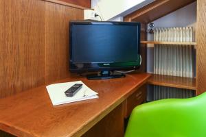 TV a/nebo společenská místnost v ubytování Guesthouse Pension Grafenstein