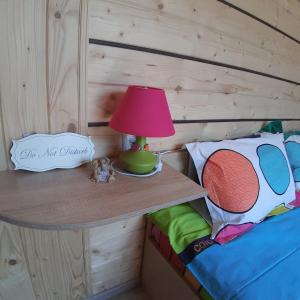 Ένα ή περισσότερα κρεβάτια σε δωμάτιο στο Apartments Girska Sonata