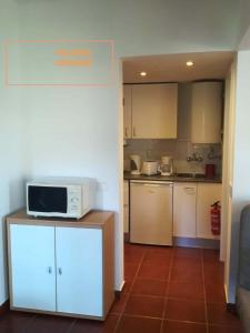 A cozinha ou kitchenette de Algarve Friendly Apartment