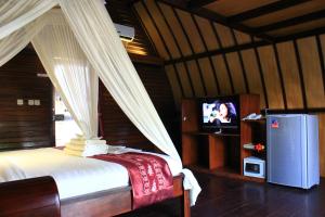 TV a/nebo společenská místnost v ubytování Turtle Beach Hotel