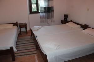 A bed or beds in a room at Nymph