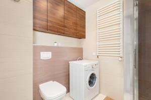 Kúpeľňa v ubytovaní Apartamenty Feniks by Noclegi Renters