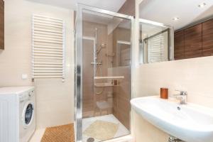 Kúpeľňa v ubytovaní Apartamenty Feniks by Noclegi Renters