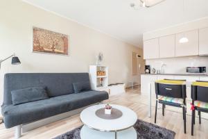 Kuchyňa alebo kuchynka v ubytovaní Apartamenty Feniks by Noclegi Renters