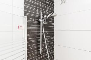 Koupelna v ubytování Apartments Köln + 38 fotografií