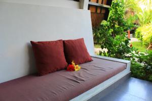 Letto o letti in una camera di Turtle Beach Hotel