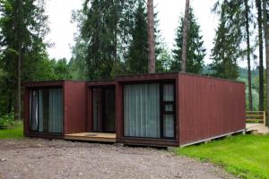 a rendering of a tiny house in the woods at Kempings Ozolkalns in Cēsis