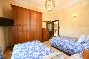 Letto o letti in una camera di Ir- Razzett t'Indri