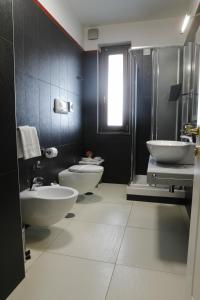 Koupelna v ubytování L' Araba Fenice Hotel & Resort