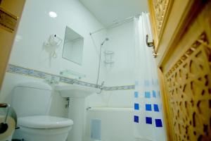 Koupelna v ubytování Basilic Boutique Hotel