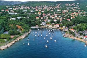 an aerial view of a river with boats in it at Apartments 4M in Kostrena