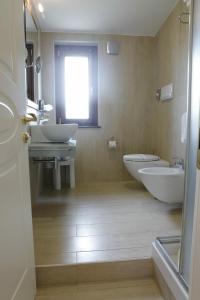 Koupelna v ubytování L' Araba Fenice Hotel & Resort