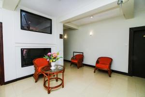 TV a/nebo společenská místnost v ubytování Omega Regency Colombo